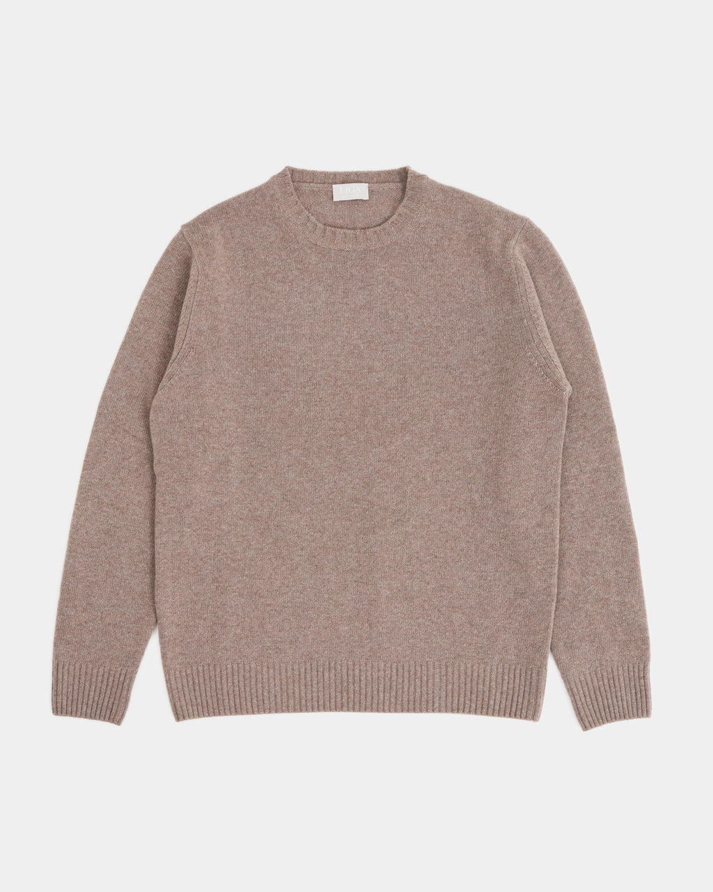 Brown sweater on a light gray background