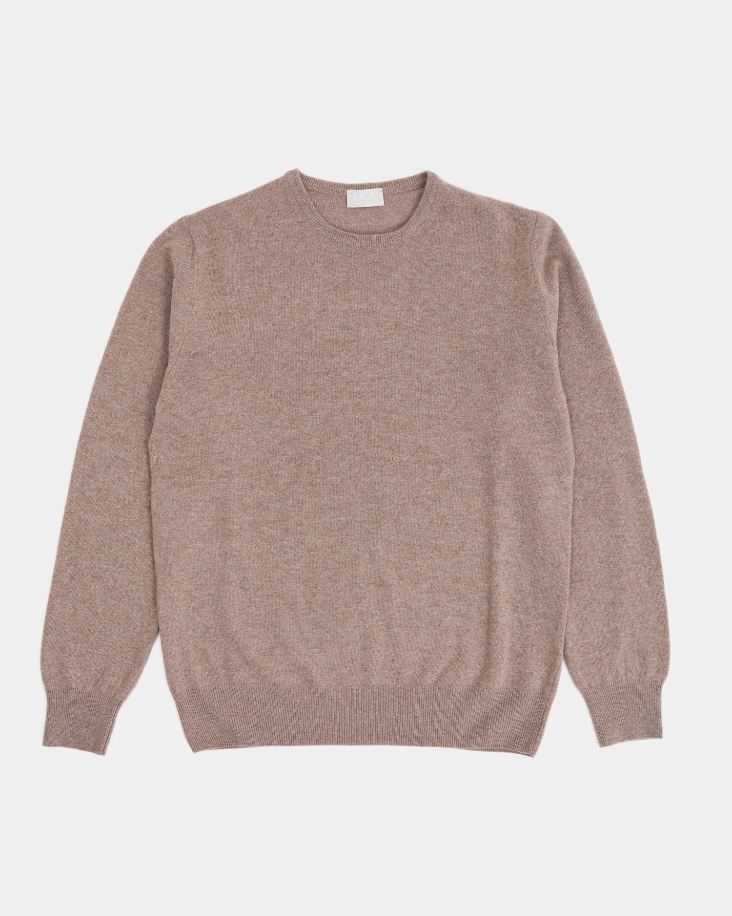 Brown sweater on a light gray background